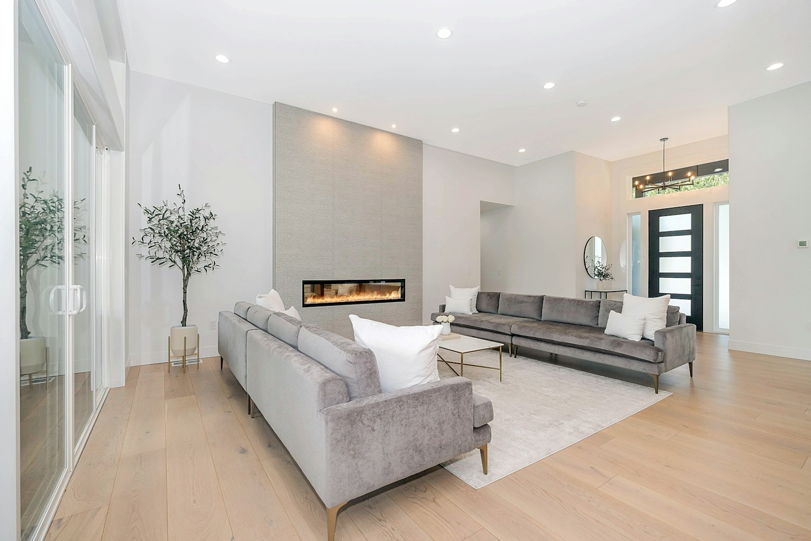 A managed Dubai apartment interior, light and planted
